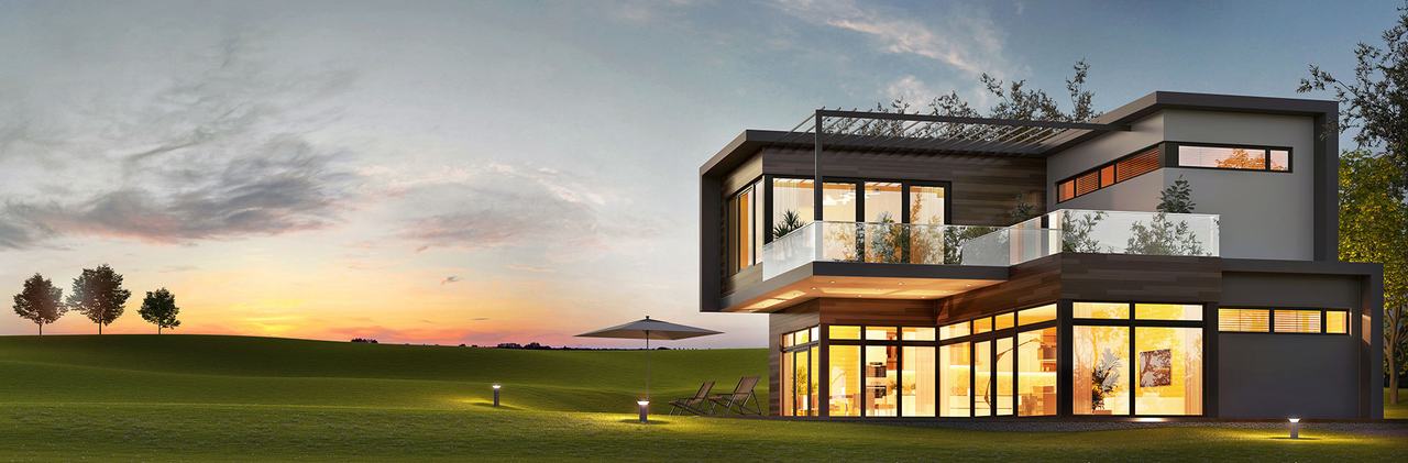 Modernes Wohnhaus mit großflächiger Verglasung in der Abenddämmerung